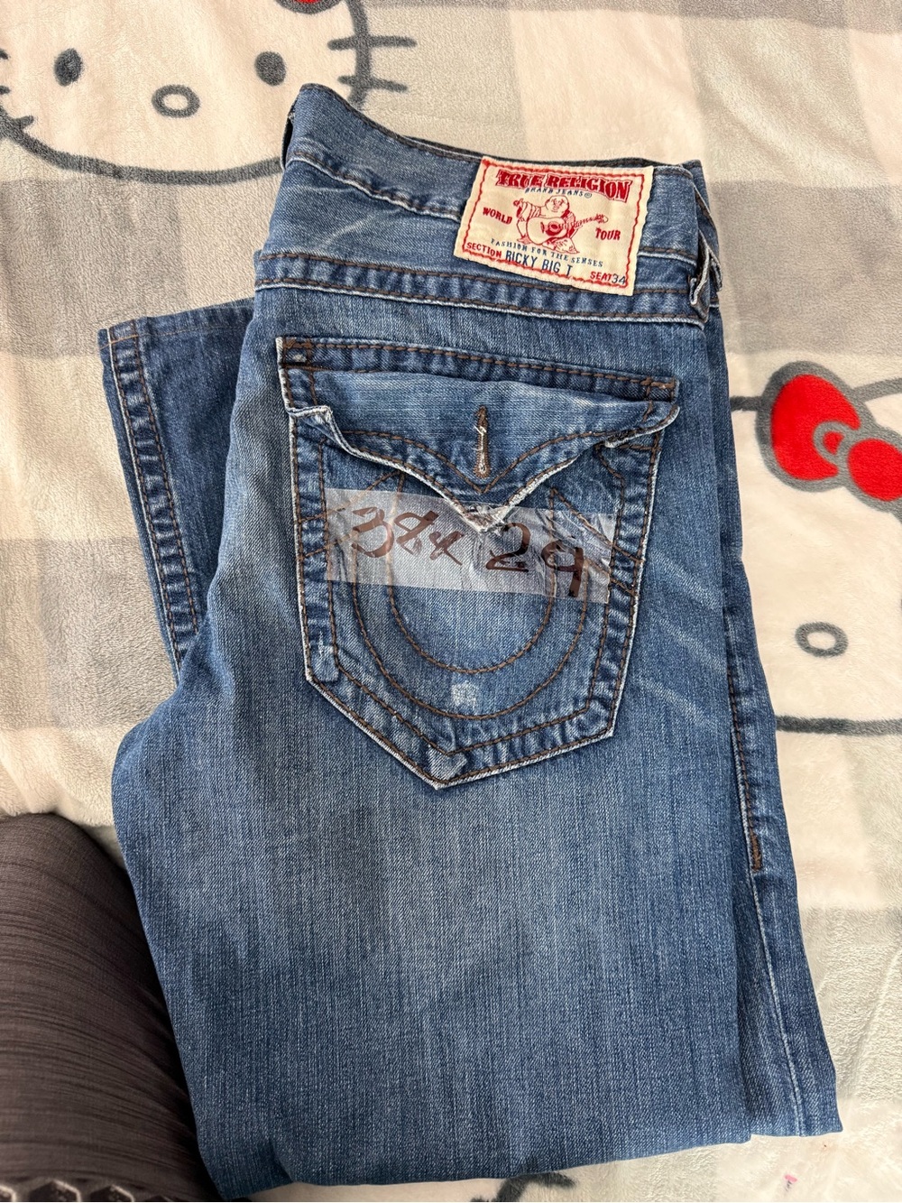 True Religion low rise bootcut jeans Ricky big t
size 36